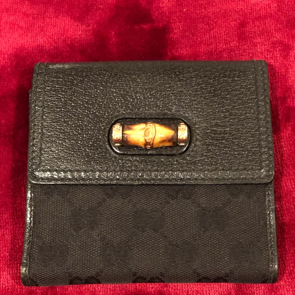 Gucci monogram wallet with bamboo closure